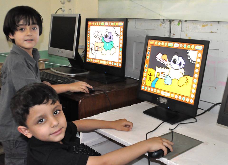 Students learning in computer lab